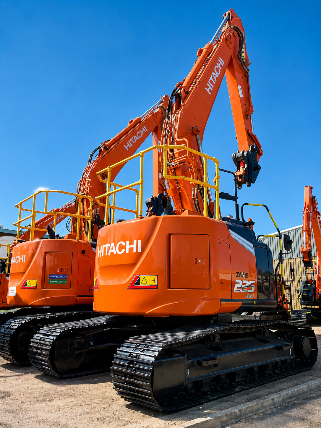 Two Hitachi ZAXIS 225 excavators at the Synergy Hire depot in Letchworth, prepared for contract hire.